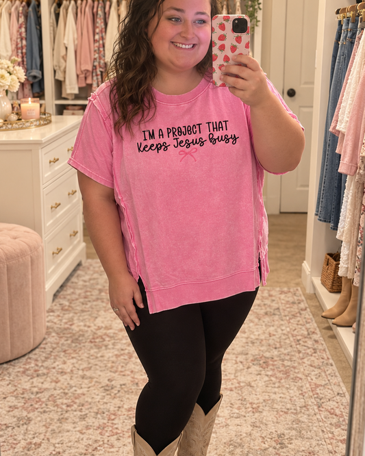 I’m a Project That Keeps Jesus Busy Pink Embroidered Top Zenana Hi Low Acid Wash Shirt